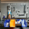 920875-21 Raised/retractable workbench with tool boards, lighting and contents x2
