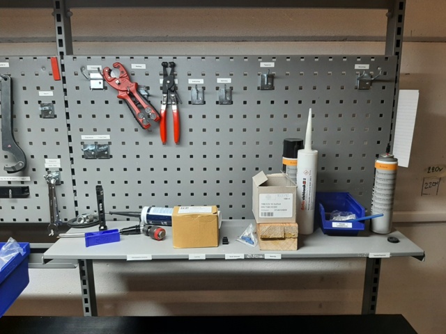 920875-22 Raised/retractable workbench with tool boards, lighting and contents x2