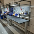 920875-24 Raised/retractable workbench with tool boards, lighting and contents x2