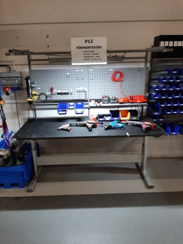 920875-2 Raised/retractable workbench with tool boards, lighting and contents x2