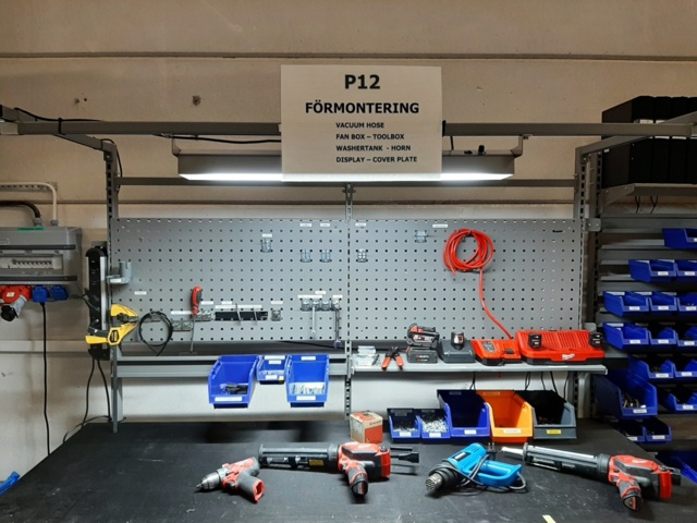 920875-4 Raised/retractable workbench with tool boards, lighting and contents x2