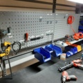 920875-8 Raised/retractable workbench with tool boards, lighting and contents x2