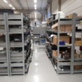 920897-2 9 shelf sections with a large assortment of new spare parts and various components