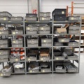 920897-3 9 shelf sections with a large assortment of new spare parts and various components
