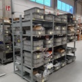 920897-1 9 shelf sections with a large assortment of new spare parts and various components