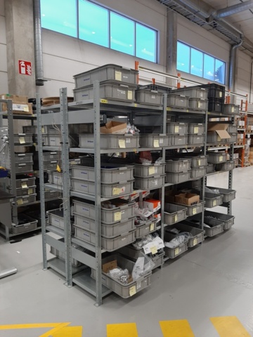 920897-1 9 shelf sections with a large assortment of new spare parts and various components
