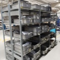 920897-5 9 shelf sections with a large assortment of new spare parts and various components