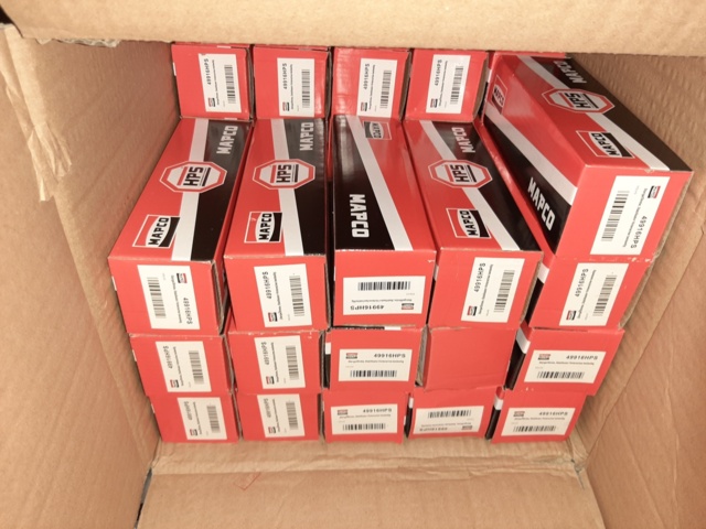920897-6 9 shelf sections with a large assortment of new spare parts and various components
