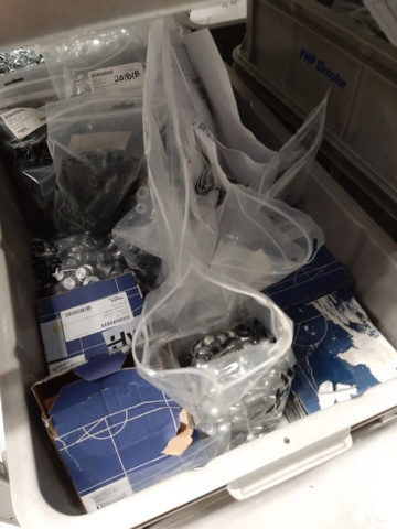 920897-14 9 shelf sections with a large assortment of new spare parts and various components