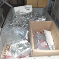 920897-25 9 shelf sections with a large assortment of new spare parts and various components