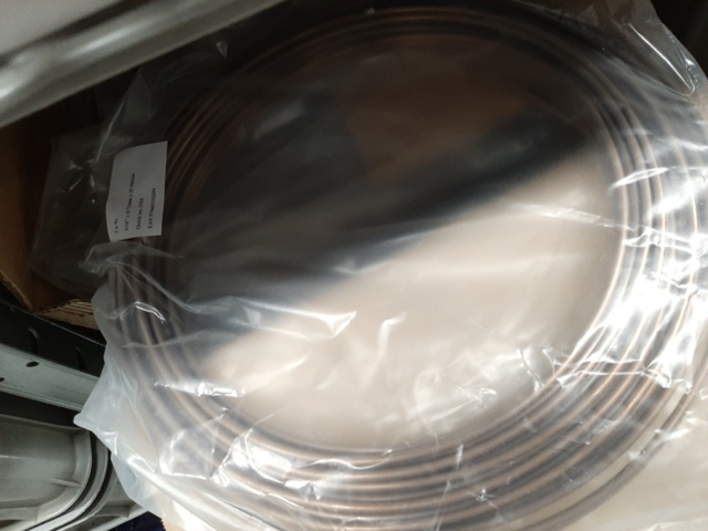 920897-27 9 shelf sections with a large assortment of new spare parts and various components