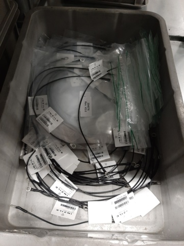 920897-34 9 shelf sections with a large assortment of new spare parts and various components