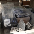 920897-36 9 shelf sections with a large assortment of new spare parts and various components