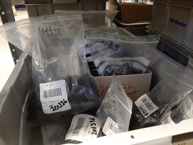 920897-36 9 shelf sections with a large assortment of new spare parts and various components