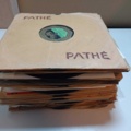 887947-1 Large stone cake / gramophone record collection