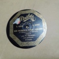 887947-4 Large stone cake / gramophone record collection