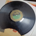887947-5 Large stone cake / gramophone record collection
