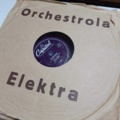 887947-7 Large stone cake / gramophone record collection