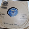 887947-8 Large stone cake / gramophone record collection