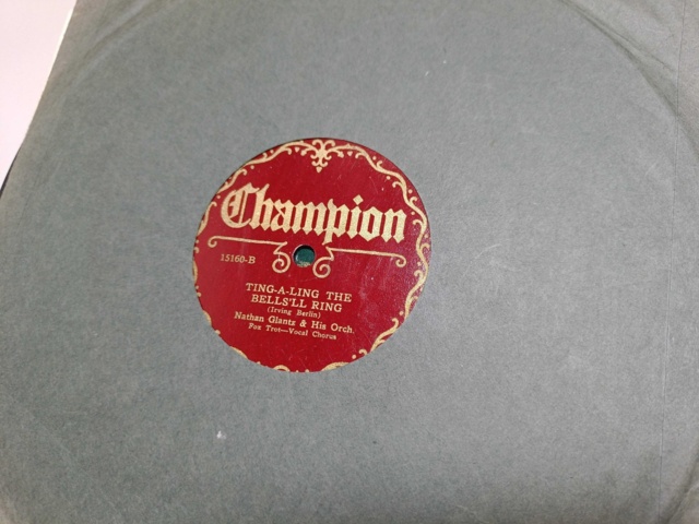 887947-9 Large stone cake / gramophone record collection