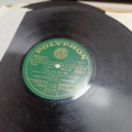887947-11 Large stone cake / gramophone record collection