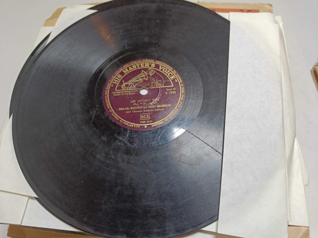 887947-12 Large stone cake / gramophone record collection