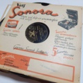 887947-31 Large stone cake / gramophone record collection