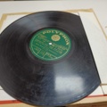 887947-35 Large stone cake / gramophone record collection