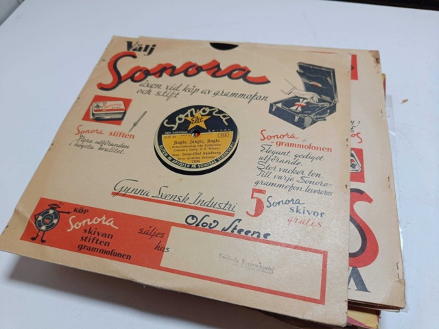 887947-39 Large stone cake / gramophone record collection