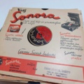 887947-40 Large stone cake / gramophone record collection