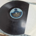 887947-44 Large stone cake / gramophone record collection