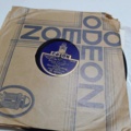 887947-48 Large stone cake / gramophone record collection