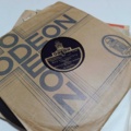 887947-50 Large stone cake / gramophone record collection