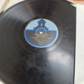 887947-51 Large stone cake / gramophone record collection