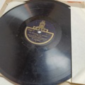 887947-52 Large stone cake / gramophone record collection