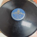 887947-55 Large stone cake / gramophone record collection