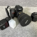 869531-14 Camera kit 'Nikon', Camera housing, lens, flash & accessories + drone
