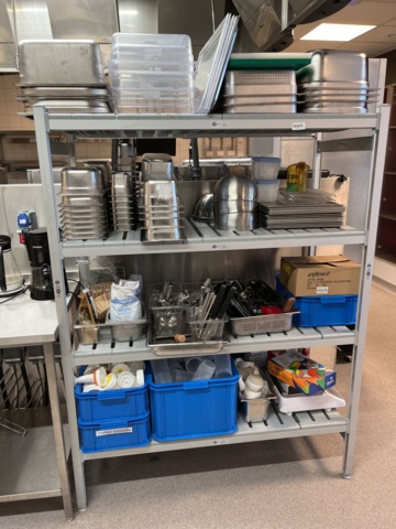 921075-1 Modular shelf with a large collection of restaurant accessories (canteens, tins, scales, etc.).