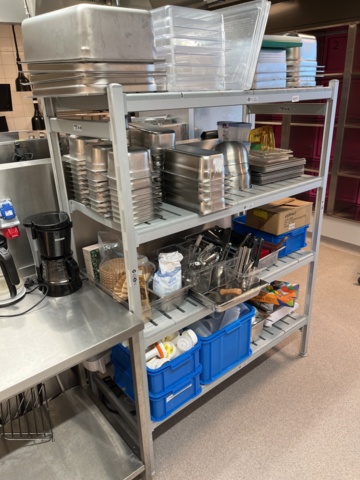 921075-2 Modular shelf with a large collection of restaurant accessories (canteens, tins, scales, etc.).