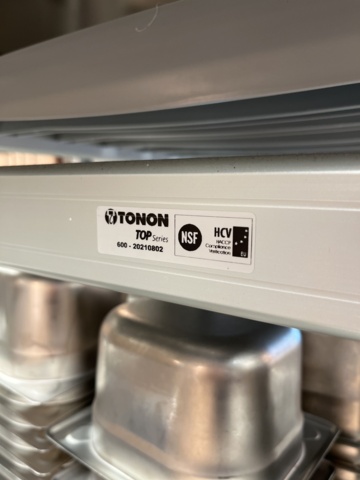 921075-9 Modular shelf with a large collection of restaurant accessories (canteens, tins, scales, etc.).