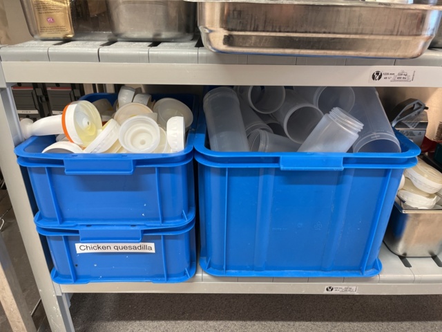 921075-13 Modular shelf with a large collection of restaurant accessories (canteens, tins, scales, etc.).