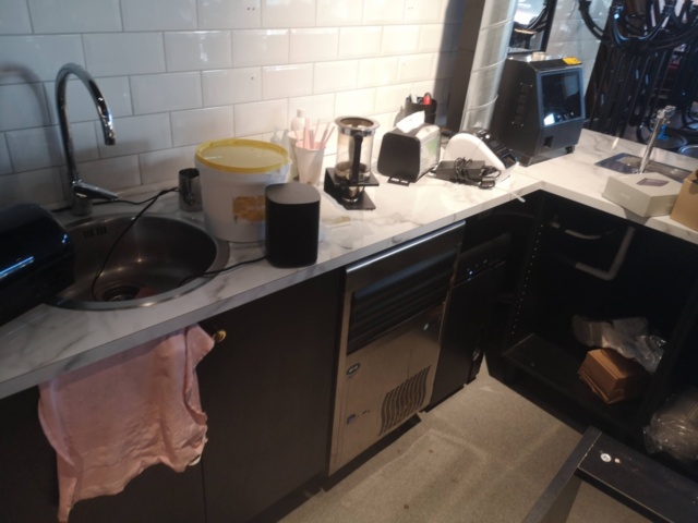 882720-7 Angled bar counter with top in colored marble