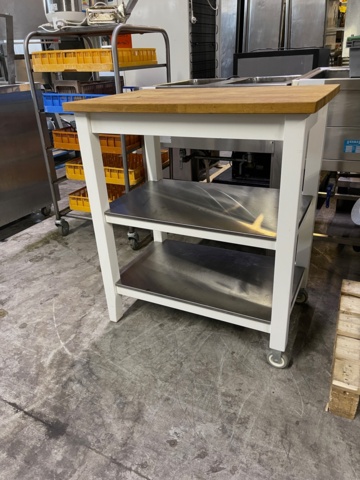 777192-1 kitchen island Wheels on one pair of legs for easier movement