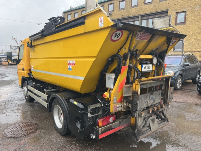 1001232-2 Garbage truck Mitsubishi Canter Fuso