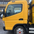 1001232-16 Garbage truck Mitsubishi Canter Fuso
