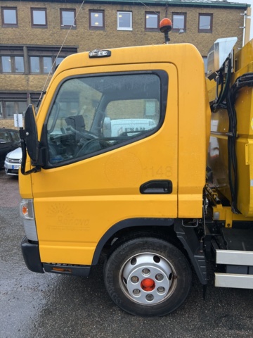 1001232-16 Garbage truck Mitsubishi Canter Fuso