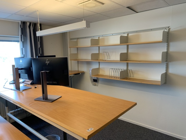 992594-1 Office furniture: Electric raise/lower desk, 4 HP 24" computer monitors, wall shelves, etc.