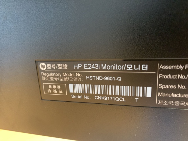 992594-7 Office furniture: Electric raise/lower desk, 4 HP 24" computer monitors, wall shelves, etc.