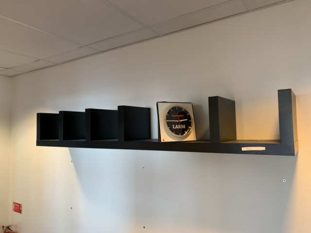 992594-8 Office furniture: Electric raise/lower desk, 4 HP 24" computer monitors, wall shelves, etc.