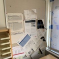 992643-5 Office furniture: Electric raise/lower desk, office chair, bookshelves, whiteboard